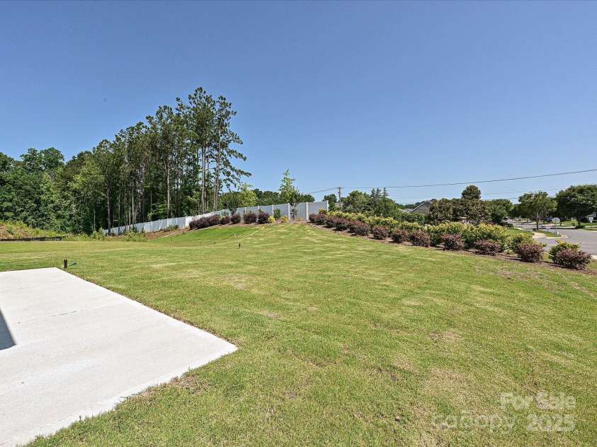 2046 Sabra Street, Gastonia, NC 28054.  MLS# CAR4257954, YatesRealty ID 12427. Rear yard