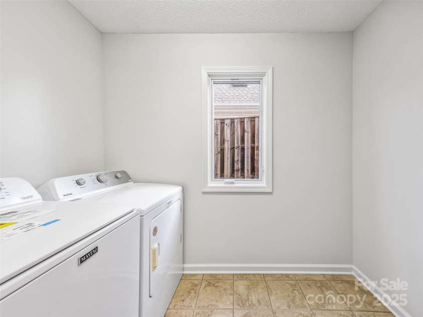 34 Beekeeper Trail, Swannanoa, NC 28778.  MLS# CAR4321966, YatesRealty ID 12434. Main level laundry room