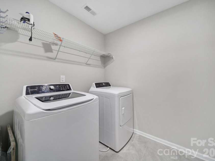 1212 Croft Drive, Fort Mill, SC 29708.  MLS# CAR4353061, YatesRealty ID 12436. LARGE LAUNDRY ROOM WITH APPLIANCES 