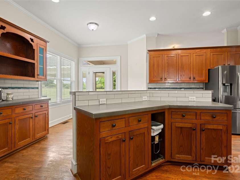 6218 Indian Trail Fairview Road, Indian Trail, NC 28079.  MLS# CAR4250864, YatesRealty ID 12442. Inlaid custom cabinets