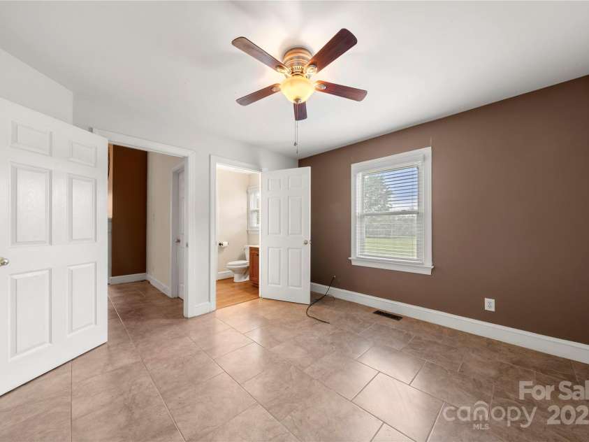 6218 Indian Trail Fairview Road, Indian Trail, NC 28079.  MLS# CAR4250864, YatesRealty ID 12442. Main floor secondary bedroom