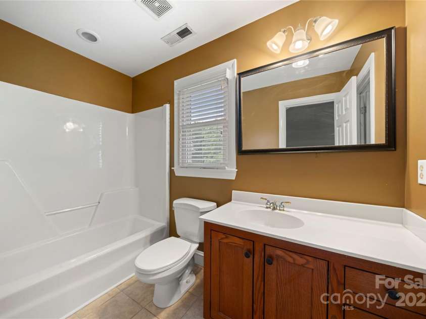 6218 Indian Trail Fairview Road, Indian Trail, NC 28079.  MLS# CAR4327618, YatesRealty ID 12442. 2nd floor bathroom