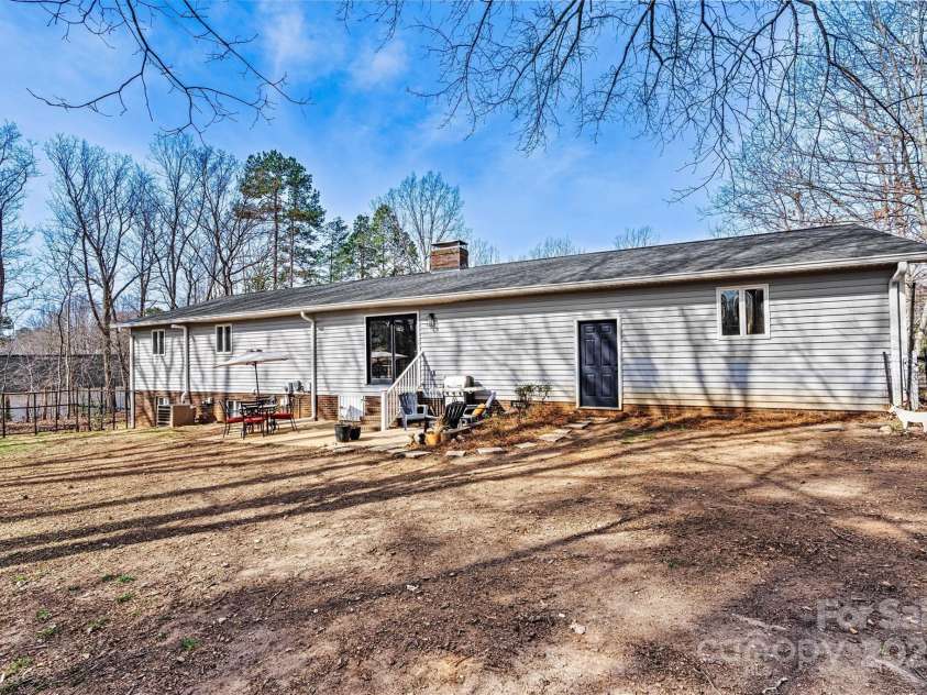 1140 Knollwood Drive, Claremont, NC 28610.  MLS# CAR4237158, YatesRealty ID 12447. Back Patio Focused View