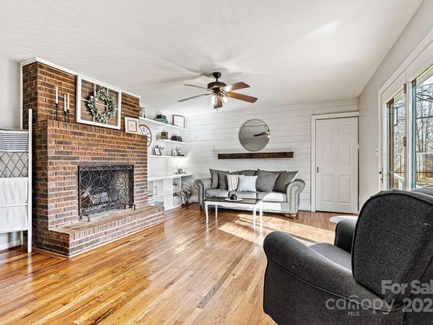 1140 Knollwood Drive, Claremont, NC 28610.  MLS# CAR4237158, YatesRealty ID 12447. Living Room/Fireplace View