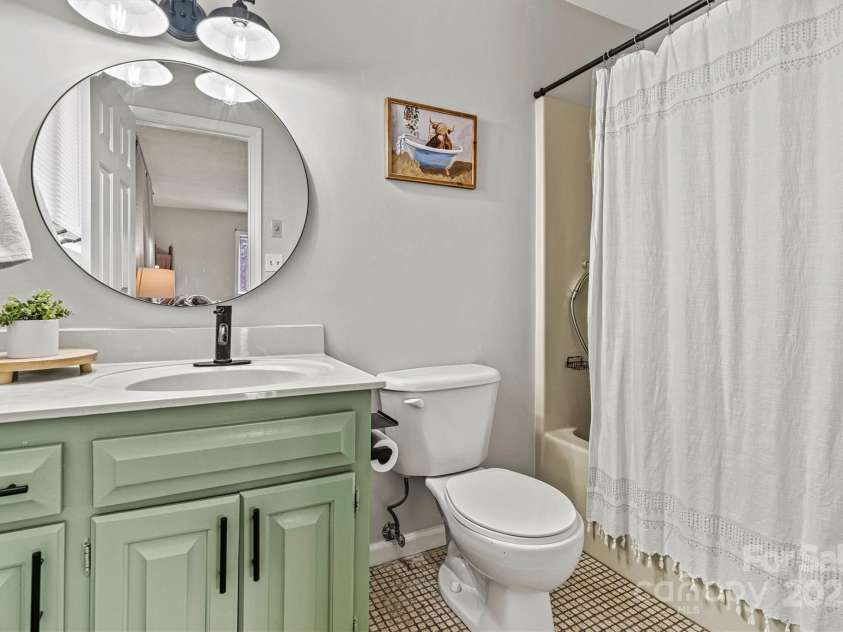 1140 Knollwood Drive, Claremont, NC 28610.  MLS# CAR4237158, YatesRealty ID 12447. Primary Bedroom/Tub View