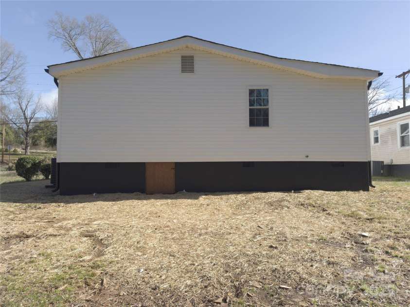 226 Malvern Drive, Concord, NC 28025.  MLS# CAR4226316, YatesRealty ID 12448. Rear Exterior