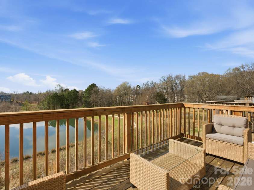 3309 Treble Court, Charlotte, NC 28262.  MLS# CAR4355630, YatesRealty ID 12451. Back deck off kitchen