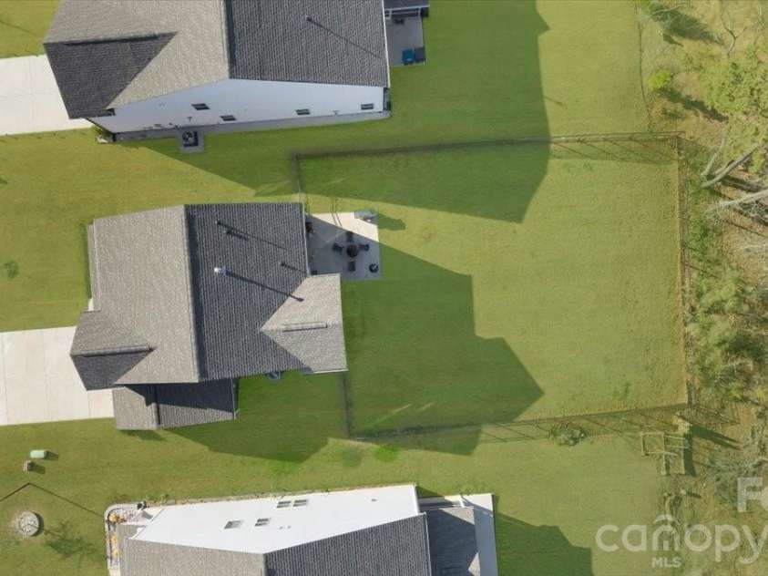 2072 Voyage Circle, Monroe, NC 28110.  MLS# CAR4332182, YatesRealty ID 12452. Grass area is fenced in