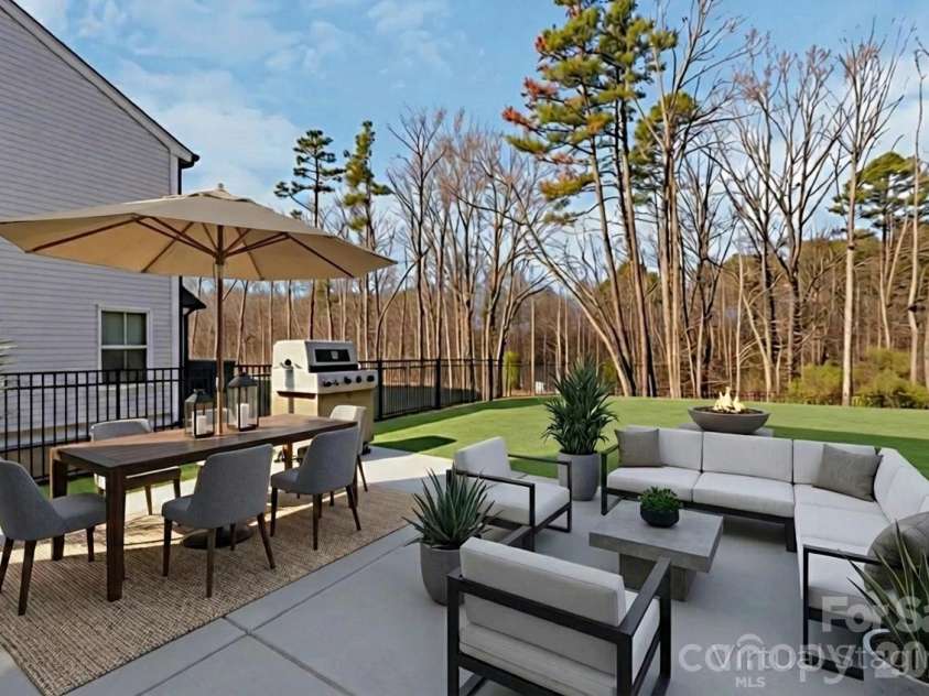 2072 Voyage Circle, Monroe, NC 28110.  MLS# CAR4332182, YatesRealty ID 12452. Virtually staged back patio