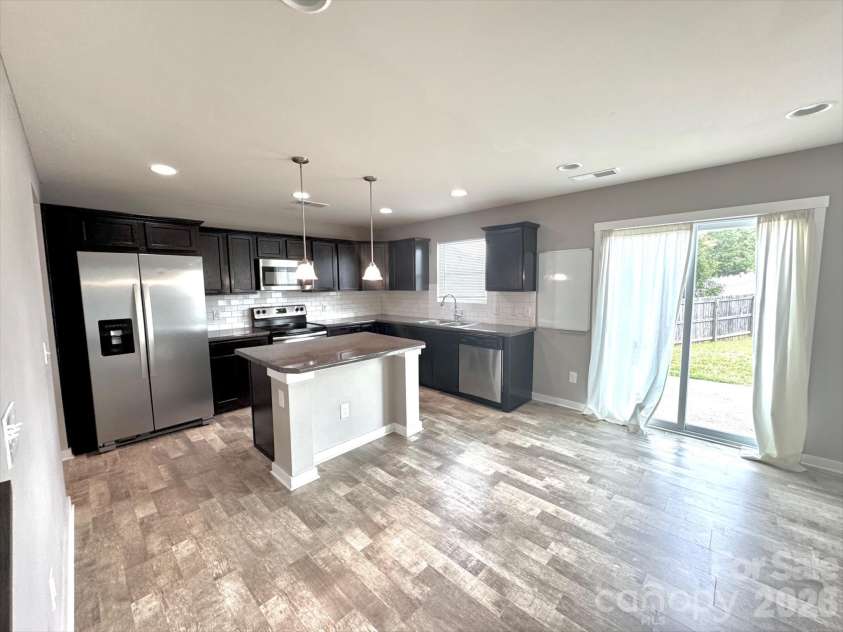 4620 Gibbons Link Road, Charlotte, NC 28269.  MLS# CAR4365740, YatesRealty ID 12463. 