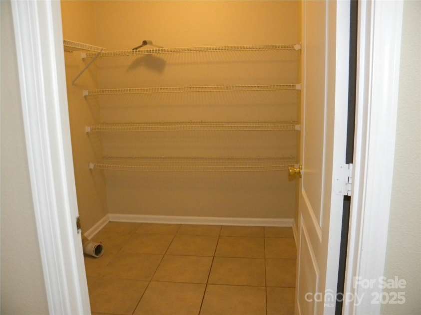 391 Morning Dew Drive, Concord, NC 28025.  MLS# CAR4249580, YatesRealty ID 12465. First Floor Laundry Room