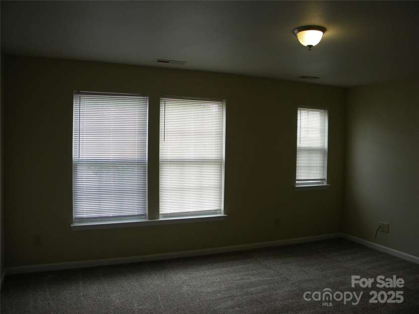 391 Morning Dew Drive, Concord, NC 28025.  MLS# CAR4249580, YatesRealty ID 12465. Primary Bedroom