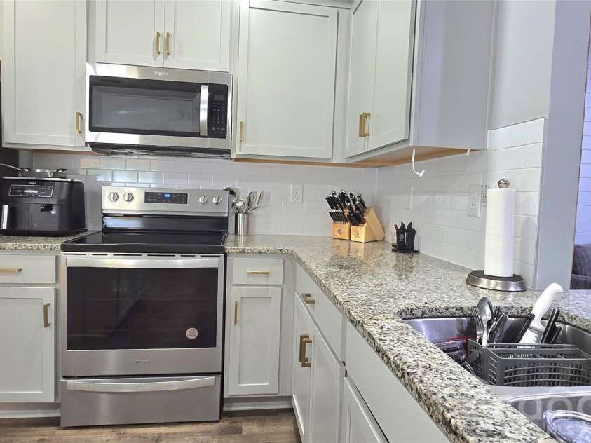 114 Wildflower Drive, Locust, NC 28097.  MLS# CAR4367738, YatesRealty ID 12469. 