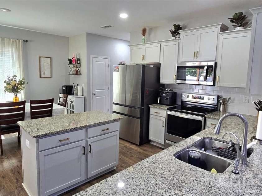 114 Wildflower Drive, Locust, NC 28097.  MLS# CAR4367738, YatesRealty ID 12469. 