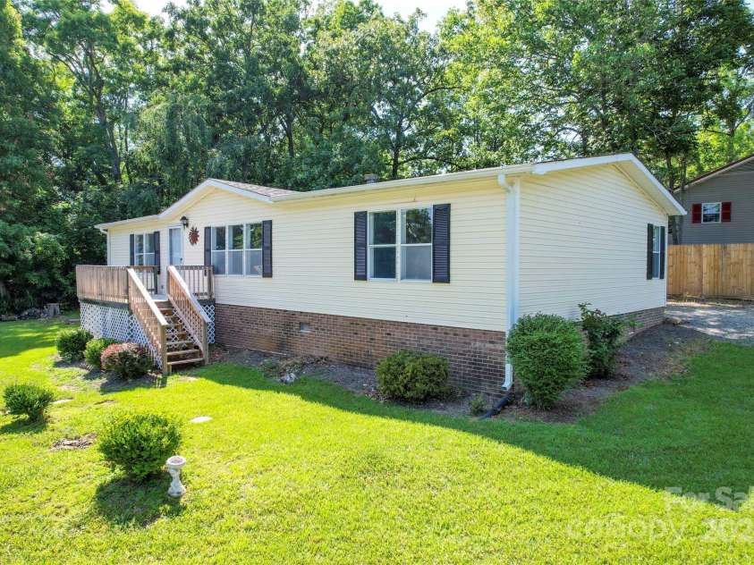 355 Shoreline Road, New London, NC 28127.  MLS# CAR4327994, YatesRealty ID 1247. 