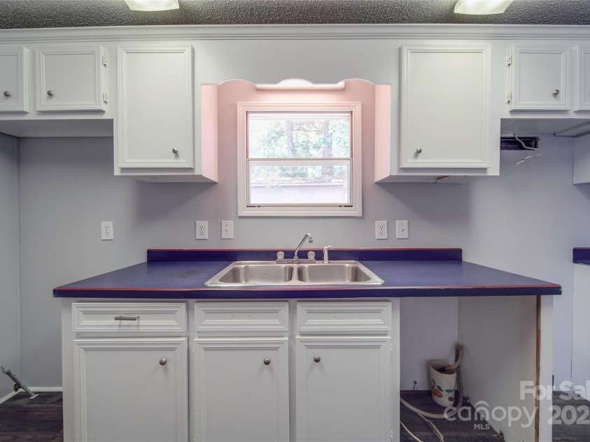 355 Shoreline Road, New London, NC 28127.  MLS# CAR4327994, YatesRealty ID 1247. 