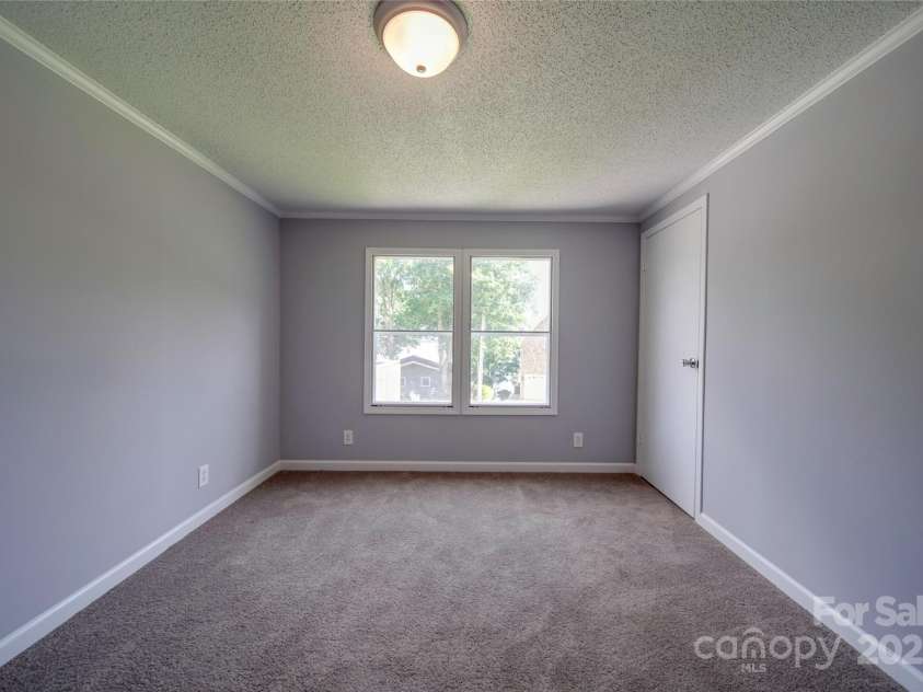 355 Shoreline Road, New London, NC 28127.  MLS# CAR4327994, YatesRealty ID 1247. 