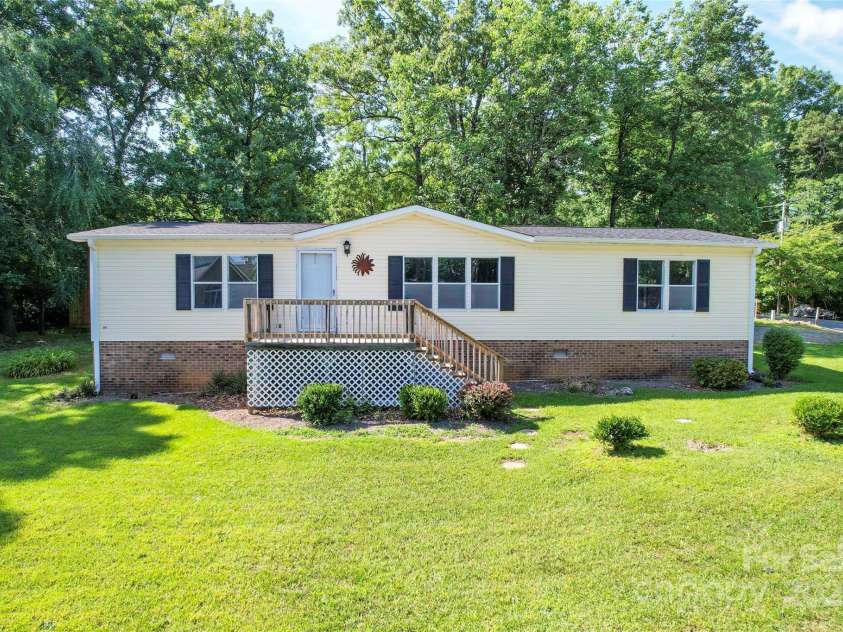 355 Shoreline Road, New London, NC 28127.  MLS# CAR4327994, YatesRealty ID 1247. 