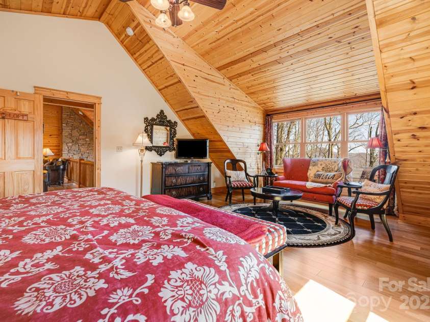 100 Flame Azalea Lane, Mars Hill, NC 28754.  MLS# CAR4248115, YatesRealty ID 12470. Every morning begins with the serene majesty of the Blue Ridge Mountains.
