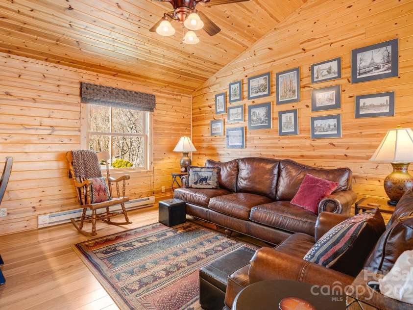 100 Flame Azalea Lane, Mars Hill, NC 28754.  MLS# CAR4248115, YatesRealty ID 12470. Loft seating area.