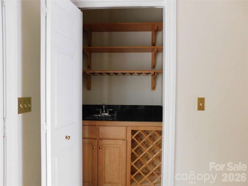 1064 Skye Drive, Pisgah Forest, NC 28768.  MLS# CAR4370821, YatesRealty ID 12470. Conveniently located, wet bar makes entertaining easy.
