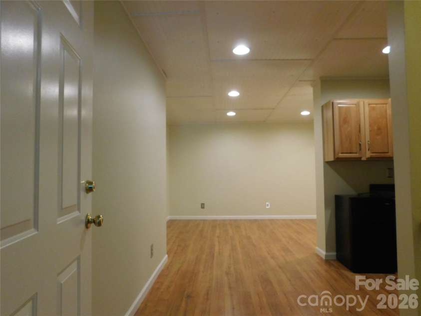 1064 Skye Drive, Pisgah Forest, NC 28768.  MLS# CAR4370821, YatesRealty ID 12470. Finished basement.