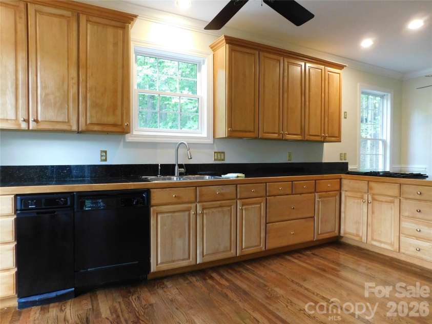 1064 Skye Drive, Pisgah Forest, NC 28768.  MLS# CAR4370821, YatesRealty ID 12470. Large kitchen with generous counter space and lots of storage.