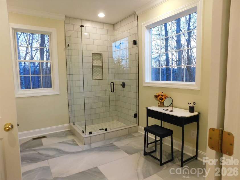 1064 Skye Drive, Pisgah Forest, NC 28768.  MLS# CAR4370821, YatesRealty ID 12470. Newly renovated Primary Bath.