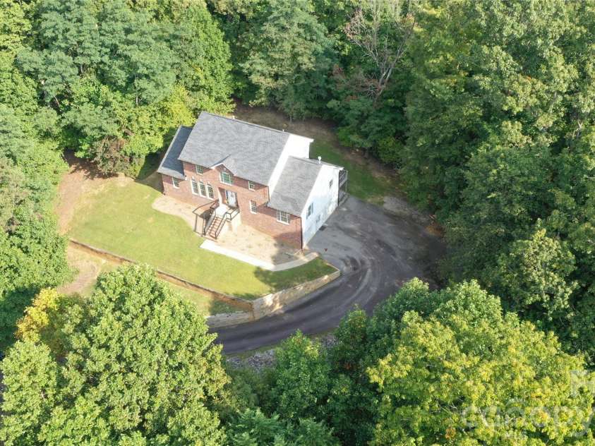 1064 Skye Drive, Pisgah Forest, NC 28768.  MLS# CAR4370821, YatesRealty ID 12470. Private, peaceful setting.