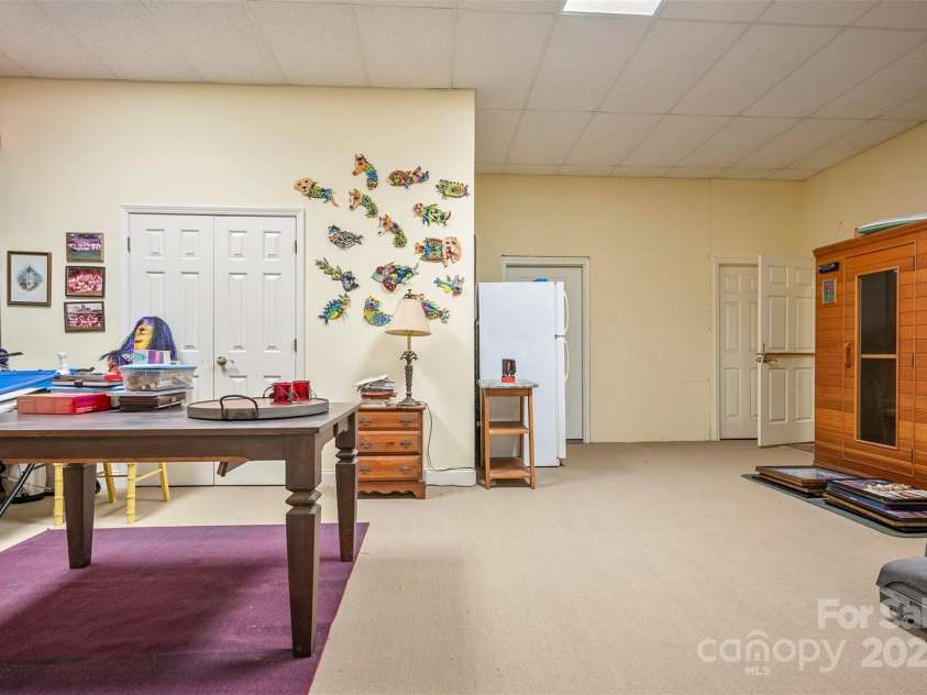 768 White Oak Lane, Tryon, NC 28782.  MLS# CAR4304996, YatesRealty ID 12472. Basement Bedroom