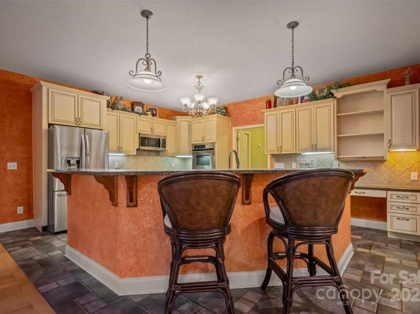 768 White Oak Lane, Tryon, NC 28782.  MLS# CAR4304996, YatesRealty ID 12472. Kitchen