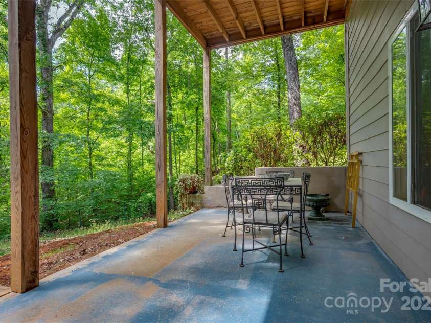 768 White Oak Lane, Tryon, NC 28782.  MLS# CAR4304996, YatesRealty ID 12472. Lower Patio