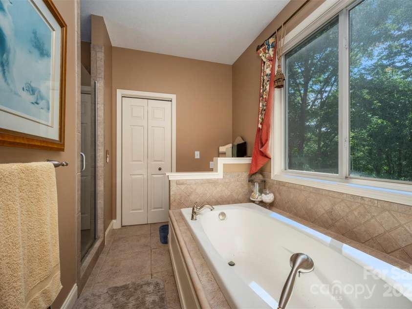 768 White Oak Lane, Tryon, NC 28782.  MLS# CAR4304996, YatesRealty ID 12472. Master bath
