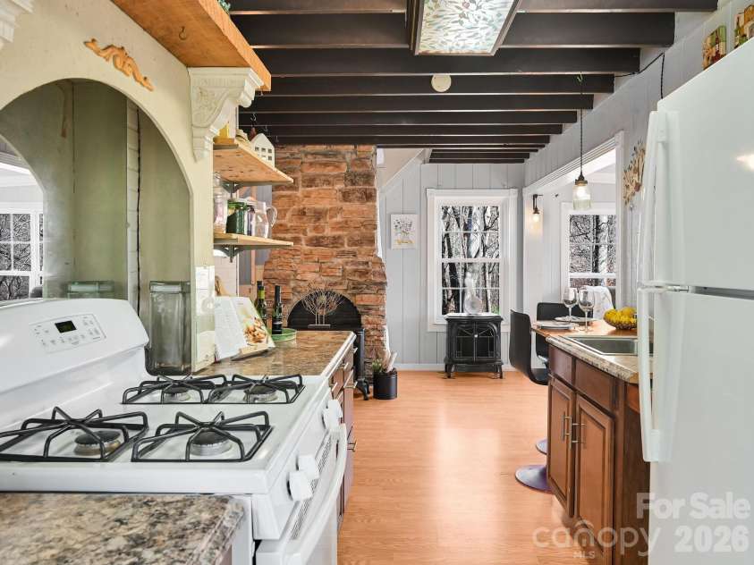 90 Davidson Gap Road, Leicester, NC 28748.  MLS# CAR4368699, YatesRealty ID 12474. Built-In Over Gas Stove