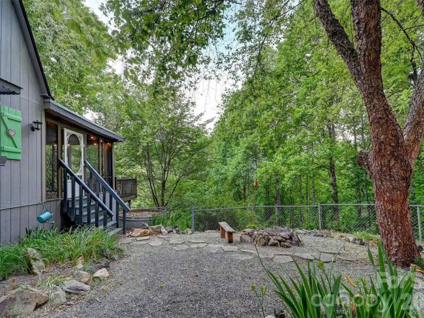 90 Davidson Gap Road, Leicester, NC 28748.  MLS# CAR4368699, YatesRealty ID 12474. Cozy, Private Fenced in Yard
