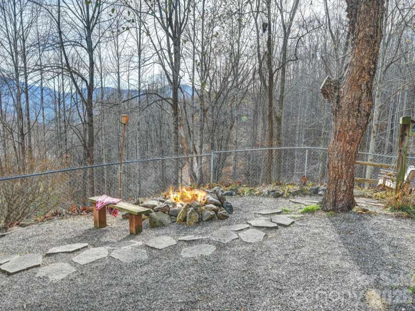 90 Davidson Gap Road, Leicester, NC 28748.  MLS# CAR4368699, YatesRealty ID 12474. Fire-Pit with Bench