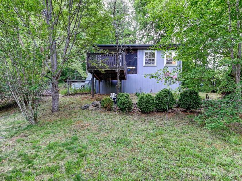 90 Davidson Gap Road, Leicester, NC 28748.  MLS# CAR4368699, YatesRealty ID 12474. Front Yard in Spring