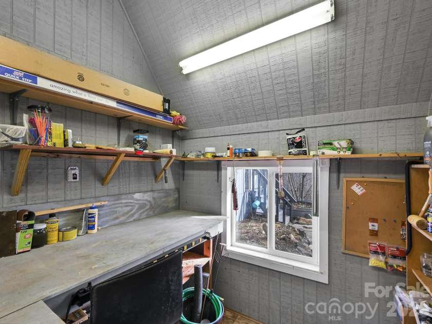 90 Davidson Gap Road, Leicester, NC 28748.  MLS# CAR4368699, YatesRealty ID 12474. Hobby Workshop with Power and A/C Unit