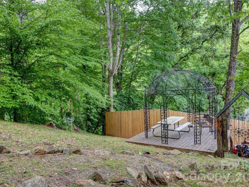 90 Davidson Gap Road, Leicester, NC 28748.  MLS# CAR4368699, YatesRealty ID 12474. Large Side Yard from Bedroom