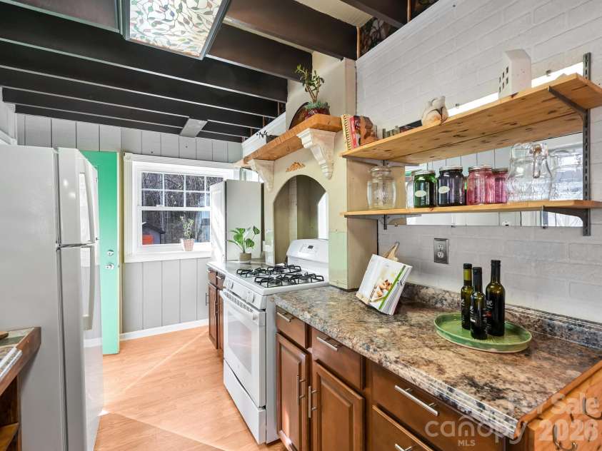 90 Davidson Gap Road, Leicester, NC 28748.  MLS# CAR4368699, YatesRealty ID 12474. Lots of Kitchen Storage