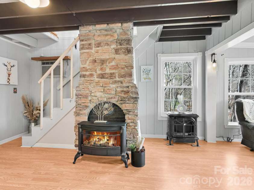 90 Davidson Gap Road, Leicester, NC 28748.  MLS# CAR4368699, YatesRealty ID 12474. New Cozy Free-Standing Fireplace