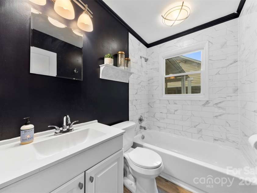 430 Sells Road, Salisbury, NC 28144.  MLS# CAR4253336, YatesRealty ID 12475. Beautifully updated bathroom with plenty of counter space