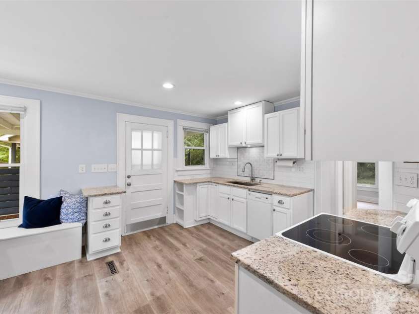430 Sells Road, Salisbury, NC 28144.  MLS# CAR4253336, YatesRealty ID 12475. Functional kitchen space with dishwasher, plenty of cabinets including lazy susan.
