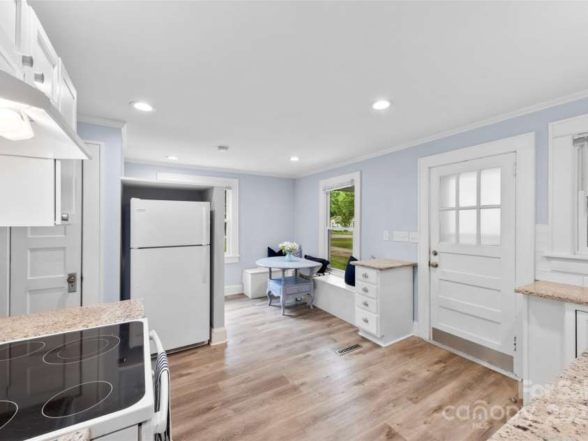430 Sells Road, Salisbury, NC 28144.  MLS# CAR4253336, YatesRealty ID 12475. Large kitchen area with refrigerator included