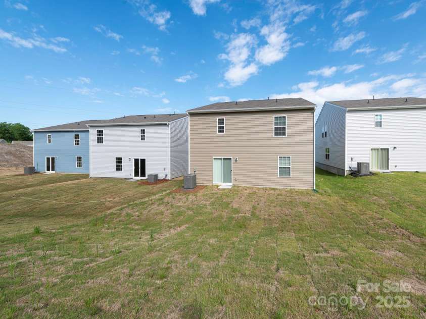 11019 Daisy Court, Charlotte, NC 28262.  MLS# CAR4255718, YatesRealty ID 12476. Back Exterior