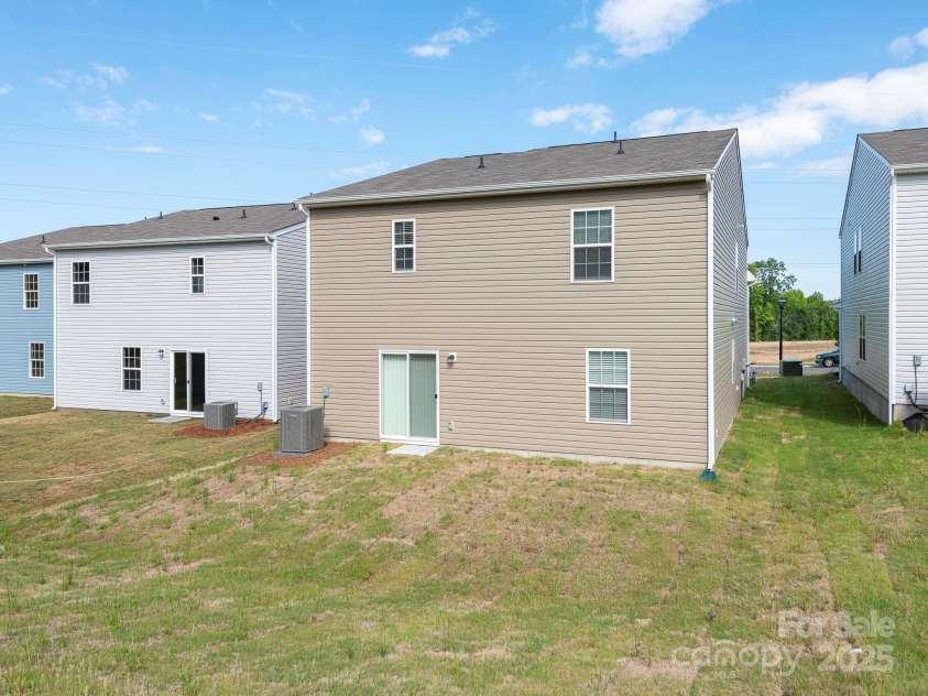 11019 Daisy Court, Charlotte, NC 28262.  MLS# CAR4255718, YatesRealty ID 12476. Back Exterior