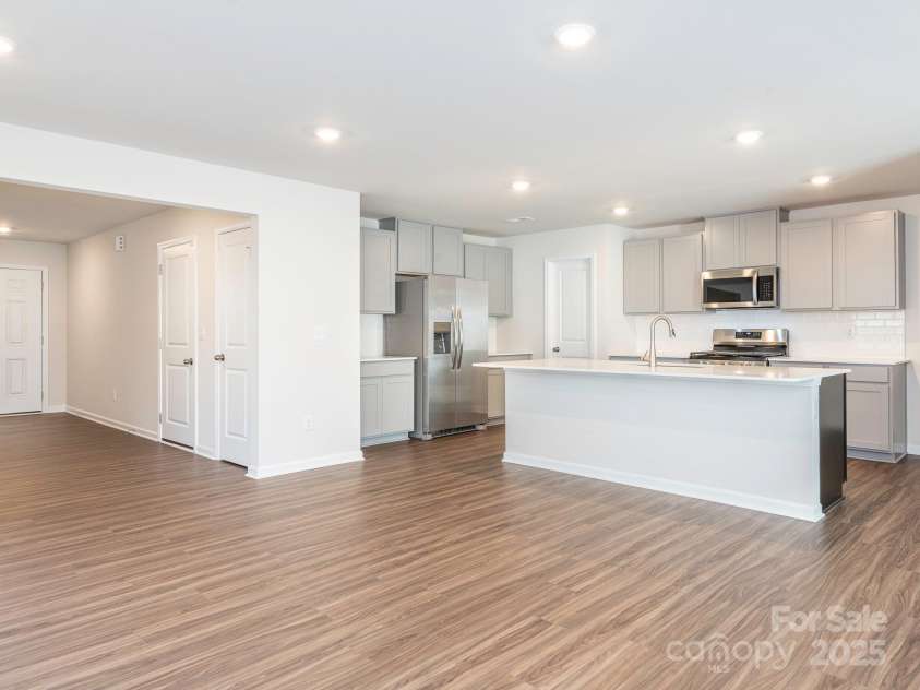11019 Daisy Court, Charlotte, NC 28262.  MLS# CAR4255718, YatesRealty ID 12476. Dining area & kitchen