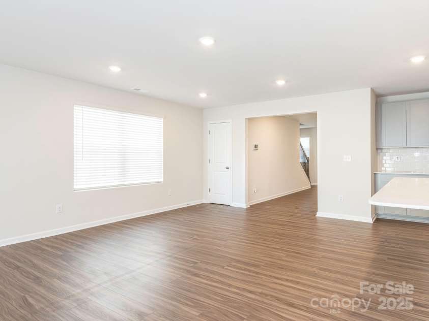 11019 Daisy Court, Charlotte, NC 28262.  MLS# CAR4255718, YatesRealty ID 12476. Dining area open to kitchen & living room