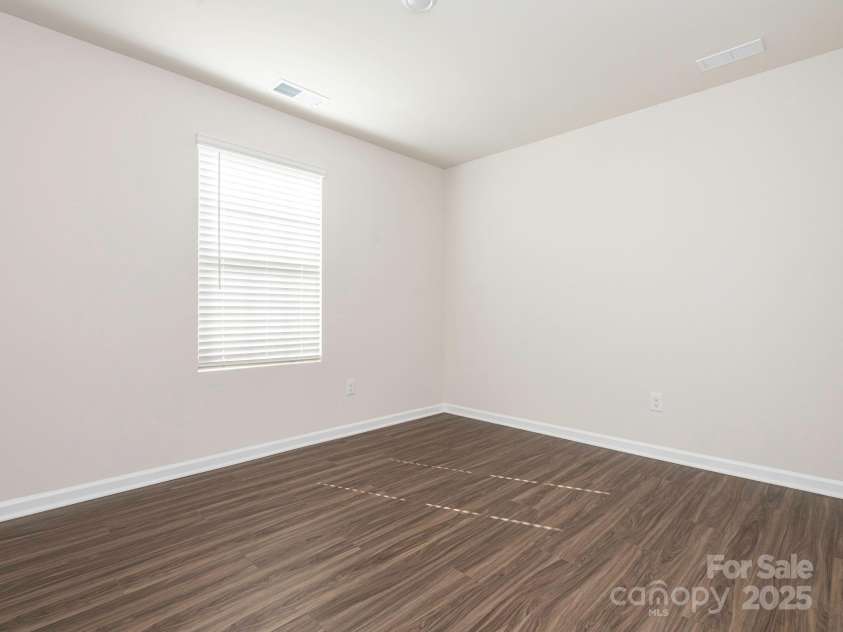 11019 Daisy Court, Charlotte, NC 28262.  MLS# CAR4255718, YatesRealty ID 12476. Main level bedroom