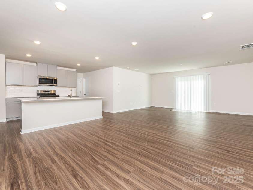 11019 Daisy Court, Charlotte, NC 28262.  MLS# CAR4255718, YatesRealty ID 12476. Open kitchen, living & dining